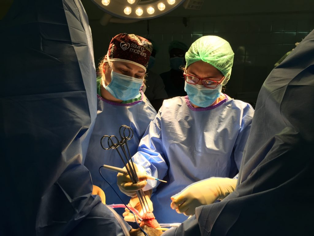 Doctors perform surgery